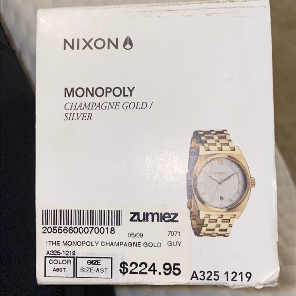 Nixon watch, champagne gold silver.